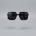 Black Oversized Sunglasses - Clear Acrylic Stand Grey Studio