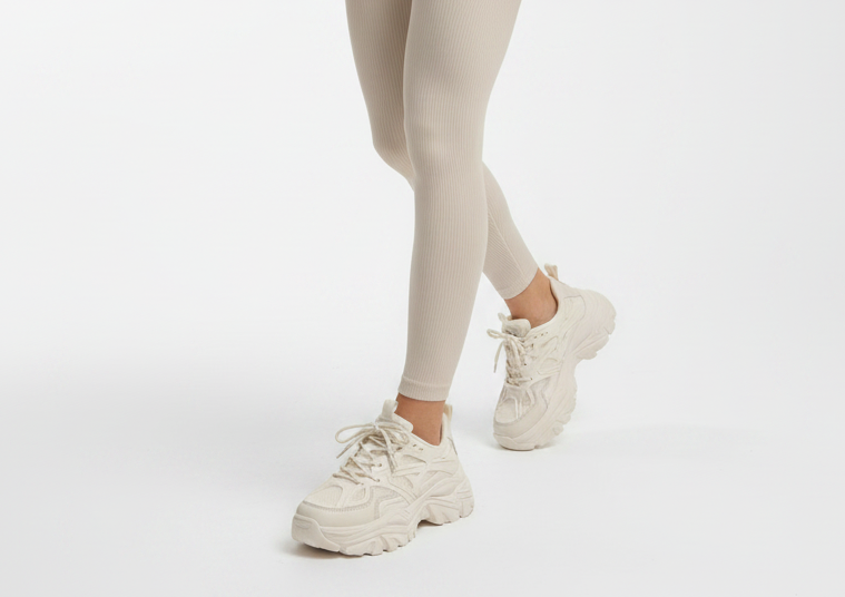 Cream Chunky Sneakers - Female Model Walking