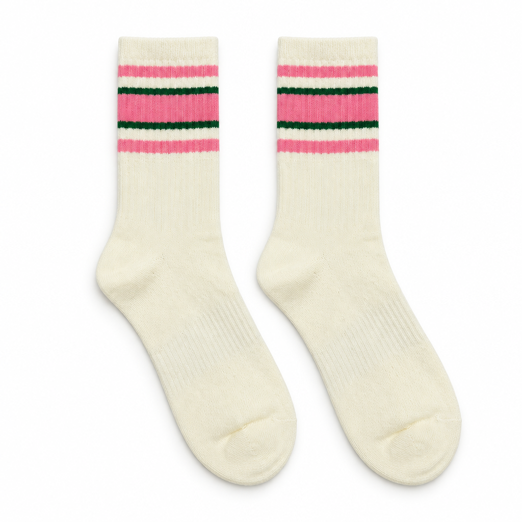 Cream socks with pink and green stripes on a seamless white background